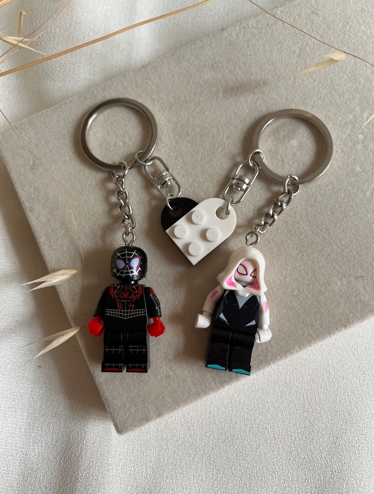 Duo lego spider man keychains
